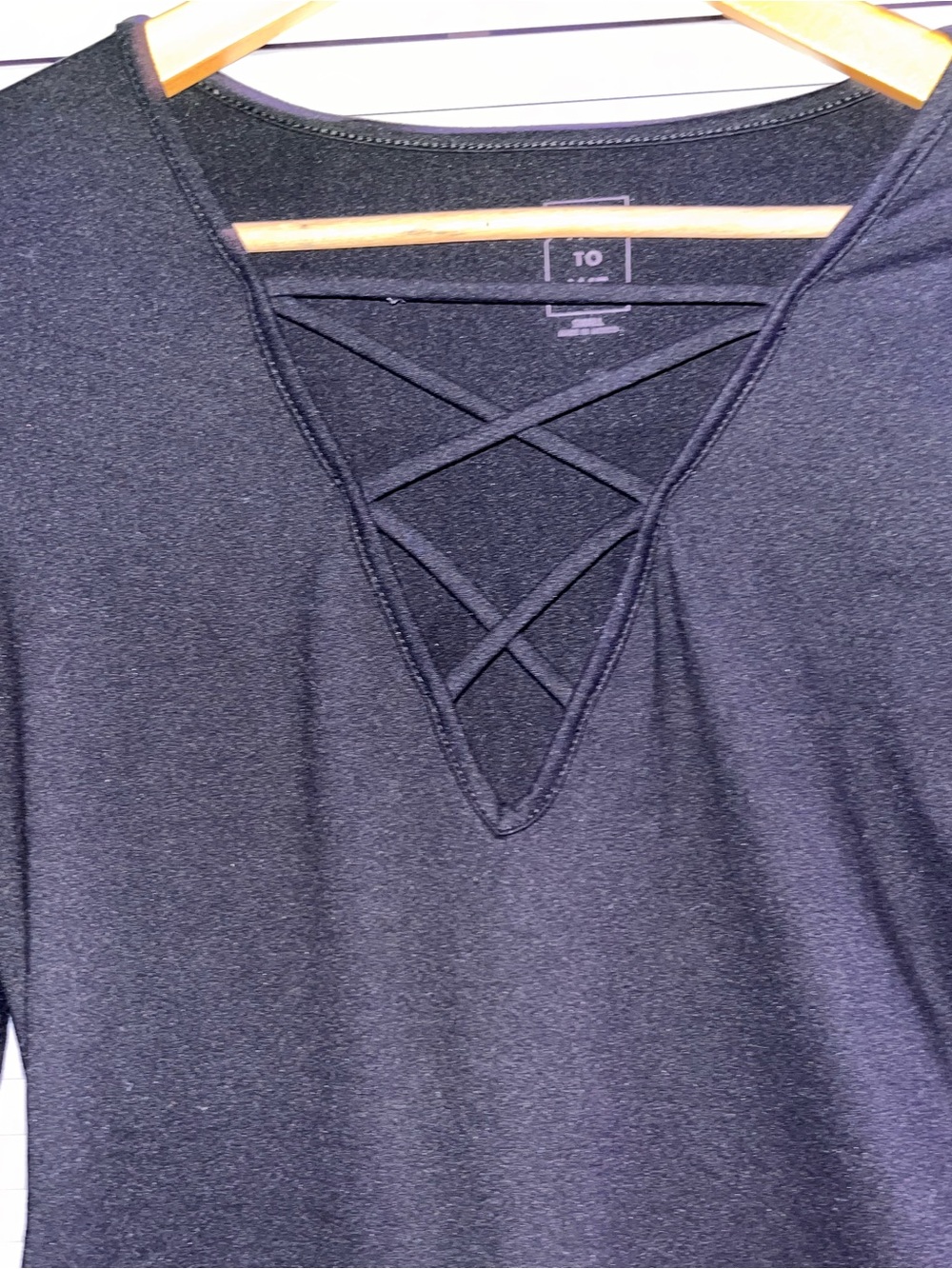 Criss cross long sleeve bodysuit